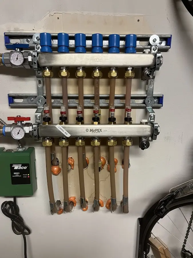 Plumber performing Water Heater Repair at a residential property in Robbins